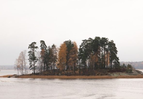 a small island in the middle of a lake